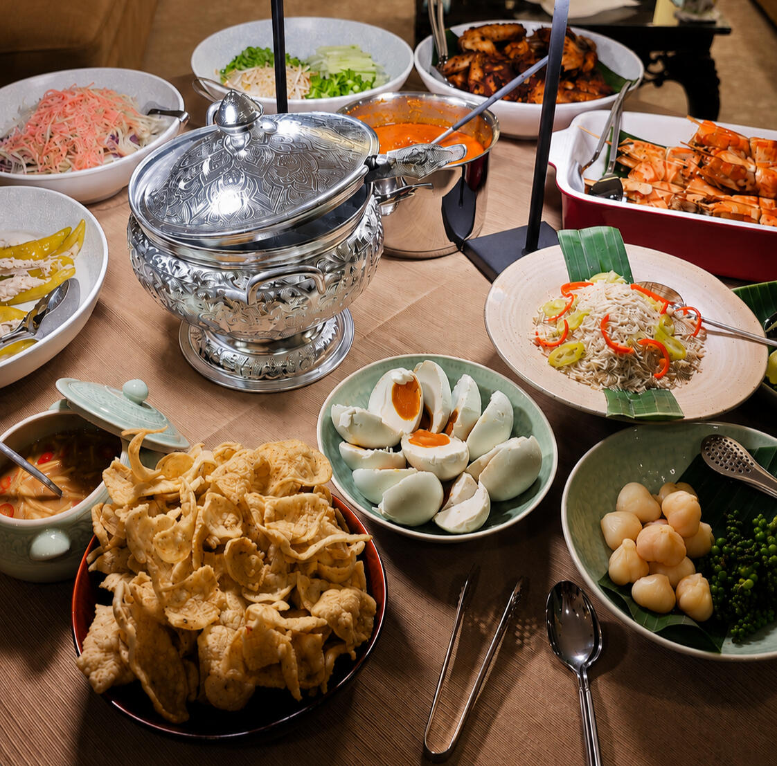 Warisan communal dining spread at KARA Private Dining in Singapore
